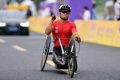 镇巴籍残疾运动员刘强利在杭州第4届亚残运会上勇夺双冠缩略图